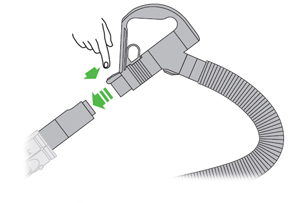 diagram showing how to remove the extension tube from the wand handle